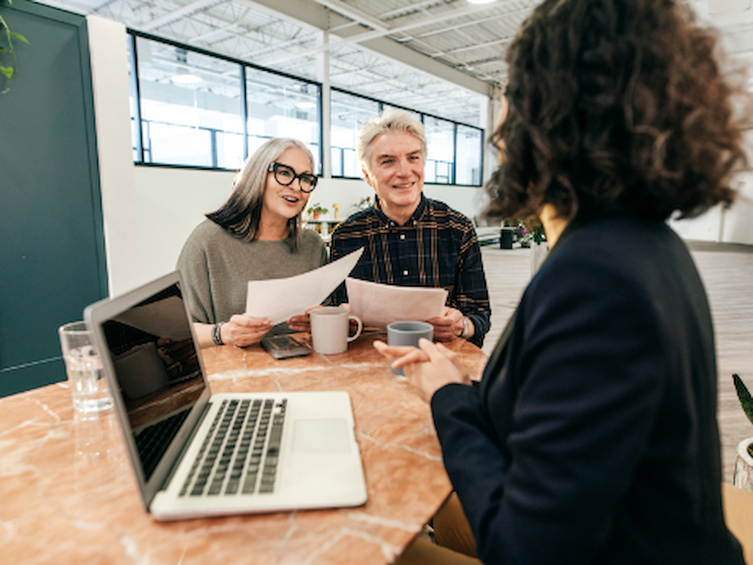 An older couple planning their estate with a solicitor